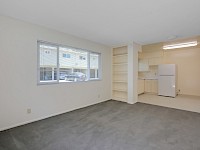 Living room with view of kitchen